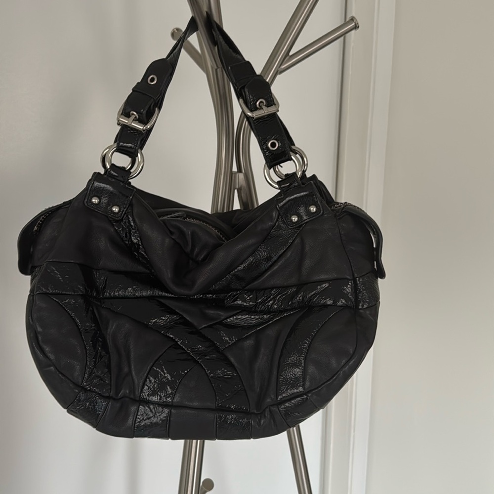 Cynthia Rowly ladies, black leather and patent leather pocketbook gently used